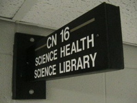 black and white sign saying Science-Health Science Library